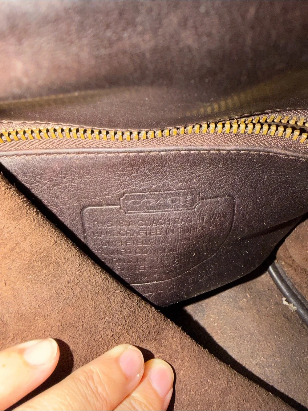 Coach some stitching